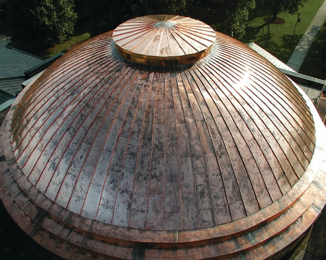 Craftsman Roofing crew installing a new roof in Fairport